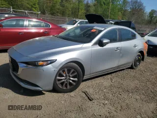2021 Mazda 3 2.0 with VIN JM1BPAA78M1318809, listed as a Copart auction lot 53634025 with Not Provided miles and Salvage Title. Bid and sale history available at DreamBid. Image 1.