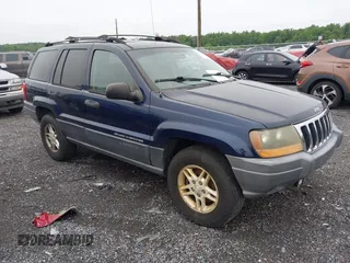 2004 Jeep Grand Cherokee Laredo z VIN 1J4GW48S84C295177, wystawiony jako IAAI lot #42414970 z przebiegiem 166 773 mil mil oraz . Historia ofert i sprzedaży dostępna na DreamBid. Obrazek 1.