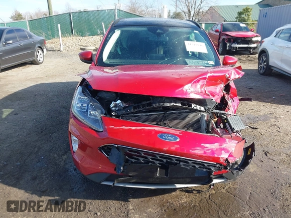 2021 Ford Escape Titanium with VIN 1FMCU9J9XMUA70800, listed as a IAAI auction lot 41717946 with Not Provided miles and . Bid and sale history available at carsss.com. Image 11.