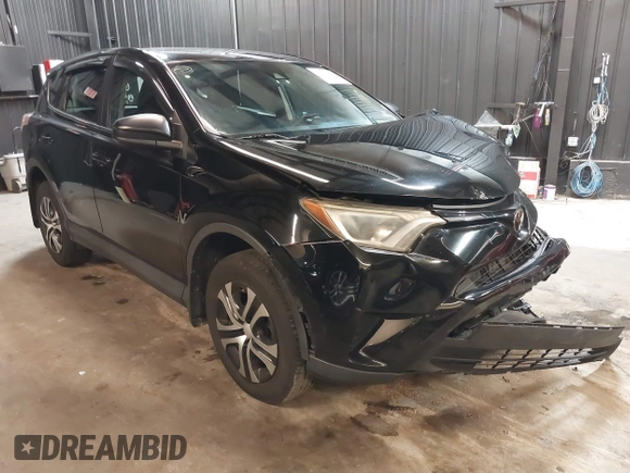2018 Toyota RAV4 LE with VIN 2T3BFREV7JW768376, listed as a IAAI auction lot 41864571 with 292,147 mi miles. Bid and sale history available at carsss.com. Image 1.