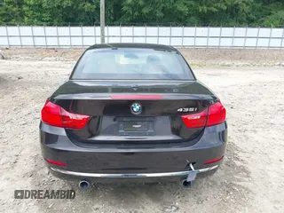 2014 BMW 4 Series 435i with VIN WBA3T3C50EJ876997, listed as a IAAI auction lot 42406299 with 115,048 mi miles and . Bid and sale history available at DreamBid. Image 16.