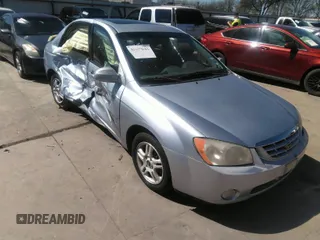 2005 Kia Spectra LX with VIN KNAFE121055121500, listed as a IAAI auction lot 39677018 with 142,307 mi miles. Bid and sale history available at carsss.com. Image 1.