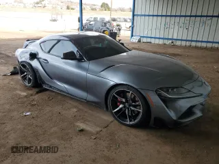 2021 Toyota GR Supra 3.0 with VIN WZ1DB0C09MW036216, listed as a Copart auction lot 86403444 with 14,800 mi miles and Salvage Title. Bid and sale history available at carsss.com. Image 4.