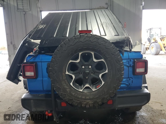 2023 Jeep Wrangler Rubicon z VIN 1C4HJXFN7PW693166, wystawiony jako Copart lot #84430324 z przebiegiem 40 093 mil mil oraz Szkoda całkowita • Salvage title. Historia ofert i sprzedaży dostępna na DreamBid. Obrazek 6.
