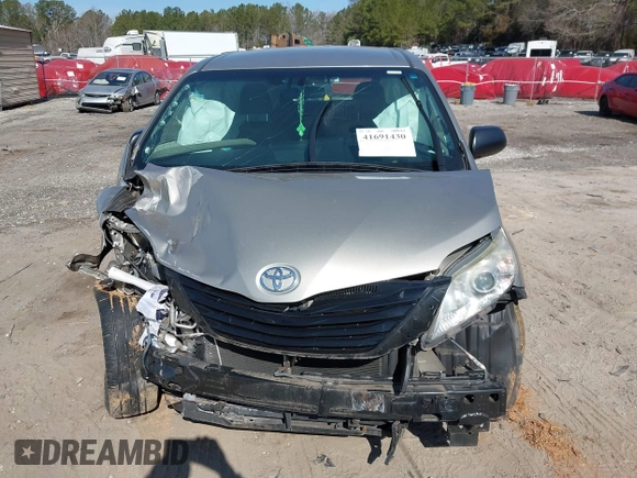 2015 Toyota Sienna L with VIN 5TDZK3DC4FS669496, listed as a IAAI auction lot 41691430 with 119,427 mi miles and . Bid and sale history available at DreamBid. Image 13.