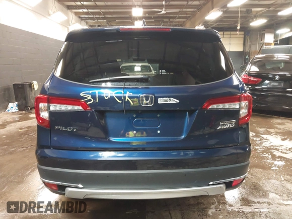 2022 Honda Pilot Touring 7-Passenger with VIN 5FNYF6H65NB052164, listed as a IAAI auction lot 41641601 with 51,700 mi miles. Bid and sale history available at carsss.com. Image 16.