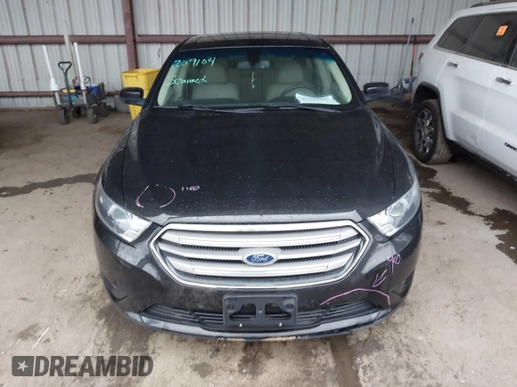 2015 Ford Taurus SEL z VIN 1FAHP2E87FG203272, wystawiony jako IAAI lot #41717231 z przebiegiem 95 829 mil mil oraz . Historia ofert i sprzedaży dostępna na DreamBid. Obrazek 12.