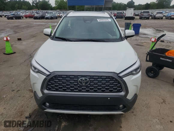 2023 Toyota Corolla Cross XLE with VIN 7MUDAABG3PV044005, listed as a Copart auction lot 54955225 with 50,712 mi miles and Salvage title. Bid and sale history available at DreamBid. Image 5.