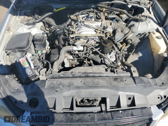 2003 Infiniti Q45 z VIN JNKBF01AX3M103002, wystawiony jako Copart lot #47860175 z przebiegiem 317 912 mil mil oraz Tytuł czysty. Historia ofert i sprzedaży dostępna na DreamBid. Obrazek 11.