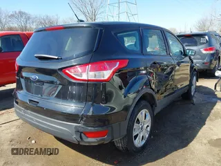 2013 Ford Escape S with VIN 1FMCU0F7XDUB69605, listed as a IAAI auction lot 41751795 with 69,621 mi miles. Bid and sale history available at carsss.com. Image 4.