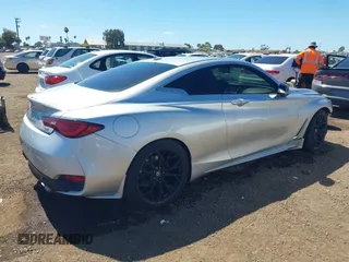 2018 Infiniti Q60 Luxe with VIN JN1EV7EK2JM343030, listed as a IAAI auction lot 42827233 with 97,945 mi miles and . Bid and sale history available at DreamBid. Image 4.