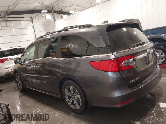 2018 Honda Odyssey Touring with VIN 5FNRL6H84JB041309, listed as a IAAI auction lot 42272247 with 90,371 mi miles and . Bid and sale history available at DreamBid. Image 14.