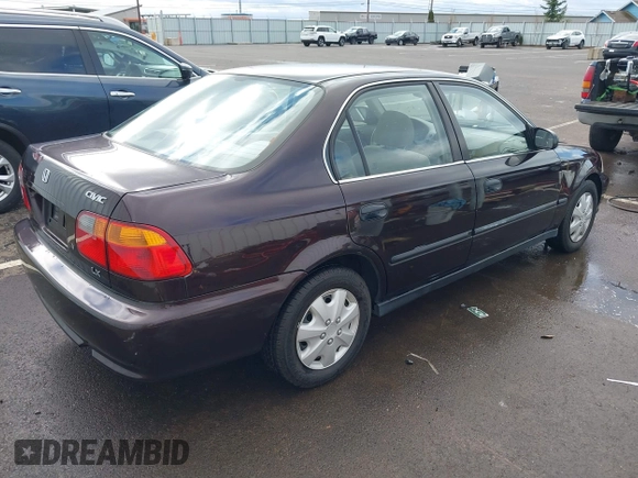 2000 Honda Civic LX with VIN 1HGEJ6676YL036362, listed as a IAAI auction lot 41912249 with 135,112 mi miles. Bid and sale history available at carsss.com. Image 4.