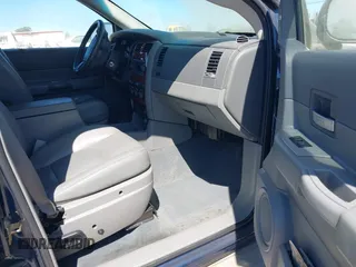 2005 Dodge Durango SLT z VIN 1D4HD48D35F532422, wystawiony jako IAAI lot #42331480 z przebiegiem 199 578 mil mil oraz . Historia ofert i sprzedaży dostępna na DreamBid. Obrazek 5.