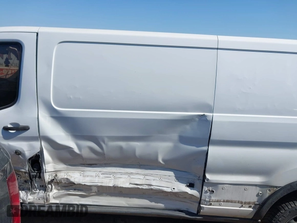 2019 Ford Transit with VIN 1FTYR2ZM5KKB12066, listed as a IAAI auction lot 41958244 with 165,495 mi miles and . Bid and sale history available at DreamBid. Image 14.