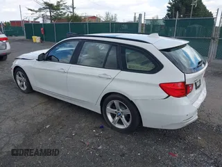 2014 BMW 3 Series 328i xDrive with VIN WBA3G7C55EKN37528, listed as a IAAI auction lot 42031076 with 55,627 mi miles and . Bid and sale history available at carsss.com. Image 3.