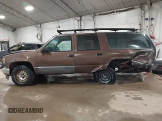 1994 GMC Suburban with VIN 1GKEC16K1RJ738915, listed as a IAAI auction lot 41717424 with 173,338 mi miles. Bid and sale history available at carsss.com. Image 13.