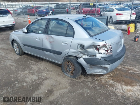 2009 Kia Rio LX with VIN KNADE223796521410, listed as a IAAI auction lot 41887883 with 82,360 mi miles and . Bid and sale history available at DreamBid. Image 3.