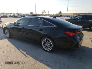 2020 Toyota Avalon Limited Hybrid z VIN 4T1C21FB2LU012066, wystawiony jako Copart lot #70624702 z przebiegiem 59 611 mil mil oraz . Historia ofert i sprzedaży dostępna na DreamBid. Obrazek 2.