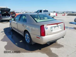 2005 Cadillac STS z VIN 1G6DC67A950171835, wystawiony jako IAAI lot #41599105 z przebiegiem 74 235 mil mil oraz . Historia ofert i sprzedaży dostępna na DreamBid. Obrazek 3.