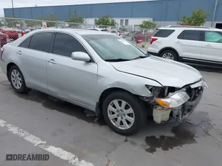 2008 Toyota Camry Hybrid with VIN 4T1BB46K18U052059, listed as a IAAI auction lot 42034899 with 210,095 mi miles. Bid and sale history available at carsss.com. Image 1.