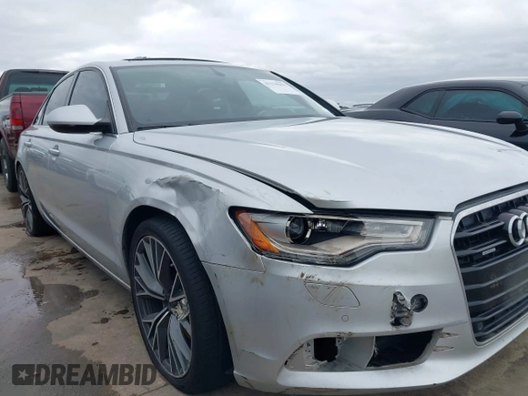 2015 Audi A6 Premium Plus z VIN WAUGFAFC8FN032627, wystawiony jako IAAI lot #41270302 z przebiegiem 82 104 mil mil oraz . Historia ofert i sprzedaży dostępna na DreamBid. Obrazek 6.