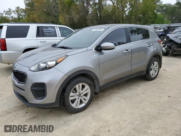 2019 Kia Sportage LX with VIN KNDPM3AC1K7590894, listed as a Copart auction lot 49582505 with 121,587 mi miles and Non Repairable. Bid and sale history available at carsss.com. Image 1.