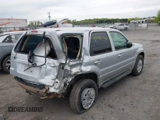 2005 Mercury Mariner Convenience z VIN 4M2YU57Z55DJ18600, wystawiony jako IAAI lot #42082068 z przebiegiem 141 530 mil mil oraz . Historia ofert i sprzedaży dostępna na DreamBid. Obrazek 4.