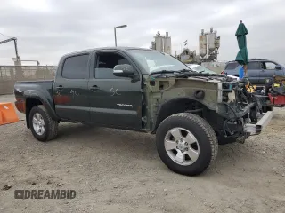 2013 Toyota Tacoma PreRunner with VIN 3TMJU4GN9DM141945, listed as a Copart auction lot 64747625 with 130,793 mi miles and Salvage title. Bid and sale history available at DreamBid. Image 4.