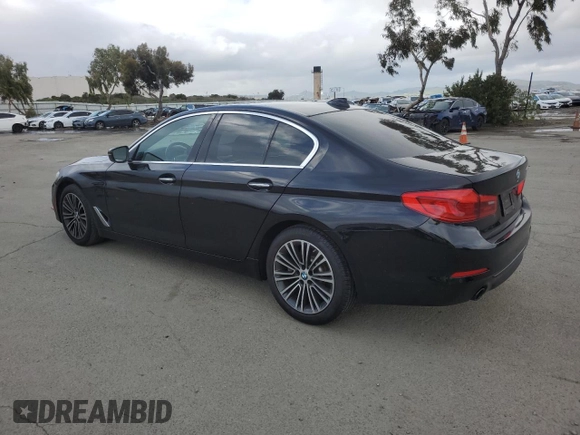 2018 BMW 5 Series 530i with VIN WBAJA5C51JWA38499, listed as a Copart auction lot 49150205 with 59,521 mi miles and Salvage Title. Bid and sale history available at DreamBid. Image 2.