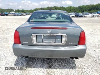 2005 Cadillac DeVille z VIN 1G6KD54Y65U205965, wystawiony jako Copart lot #58630405 z przebiegiem 129 448 mil mil oraz Czysty tytuł • Clean title. Historia ofert i sprzedaży dostępna na DreamBid. Obrazek 6.