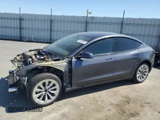 2023 Tesla Model 3 with VIN 5YJ3E1EA8PF512512, listed as a Copart auction lot 56300065 with 33,503 mi miles and Salvage title. Bid and sale history available at DreamBid. Image 1.