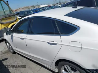 2016 Ford Fusion Titanium Hybrid with VIN 3FA6P0RU1GR259947, listed as a IAAI auction lot 41695377 with 97,605 mi miles. Bid and sale history available at carsss.com. Image 15.