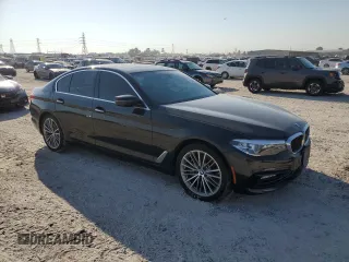 2018 BMW 5 Series 530i with VIN WBAJA5C54JG899845, listed as a Copart auction lot 76386124 with 57,379 mi miles and Salvage Title. Bid and sale history available at DreamBid. Image 4.