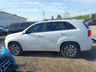 2011 Kia Sorento SX with VIN 5XYKWDA29BG121492, listed as a IAAI auction lot 42144446 with 203,556 mi miles and . Bid and sale history available at DreamBid. Image 14.