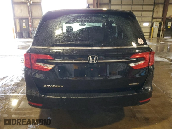 2021 Honda Odyssey Touring with VIN 5FNRL6H84MB009125, listed as a Copart auction lot 58248385 with 55,360 mi miles and Salvage title. Bid and sale history available at DreamBid. Image 6.