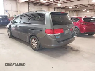 2010 Honda Odyssey EX-L with VIN 5FNRL3H7XAB080170, listed as a IAAI auction lot 41241879 with 221,272 mi miles. Bid and sale history available at carsss.com. Image 3.