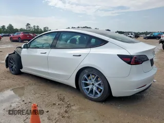 2023 Tesla Model 3 with VIN 5YJ3E1EA1PF550454, listed as a Copart auction lot 58985695 with 19,199 mi miles and Salvage title. Bid and sale history available at DreamBid. Image 2.