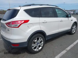 2013 Ford Escape SEL with VIN 1FMCU9HXXDUD82944, listed as a IAAI auction lot 42079667 with 97,304 mi miles. Bid and sale history available at carsss.com. Image 4.