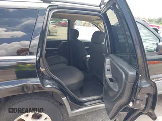 2002 Jeep Grand Cherokee Laredo with VIN 1J4GX48S22C226527, listed as a IAAI auction lot 42630457 with 197,333 mi miles and . Bid and sale history available at DreamBid. Image 8.