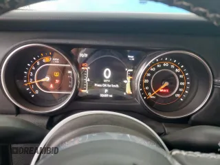 2023 Jeep Wrangler Sahara with VIN 1C4HJXEG7PW590252, listed as a Copart auction lot 59377765 with 32,689 mi miles and Salvage title. Bid and sale history available at DreamBid. Image 9.