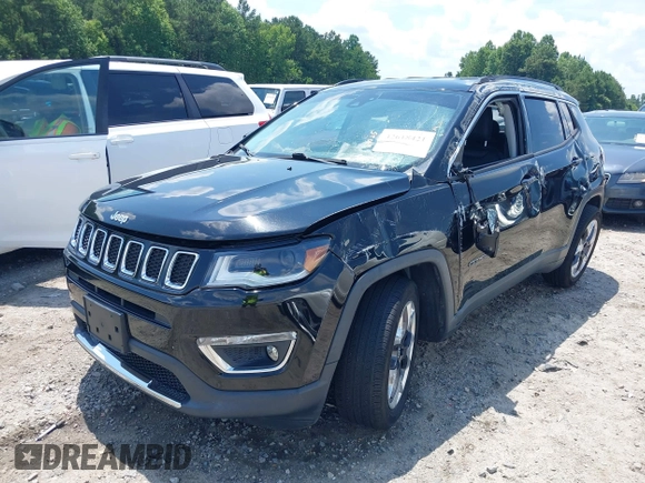2018 Jeep Compass Limited with VIN 3C4NJDCBXJT332524, listed as a IAAI auction lot 42618421 with 61,854 mi miles and . Bid and sale history available at DreamBid. Image 2.