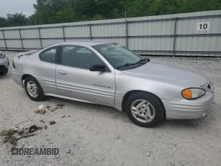 2001 Pontiac Grand Am with VIN 1G2NE12TX1M668035, listed as a Copart auction lot 59700585 with 60,965 mi miles and Salvage title. Bid and sale history available at DreamBid. Image 4.