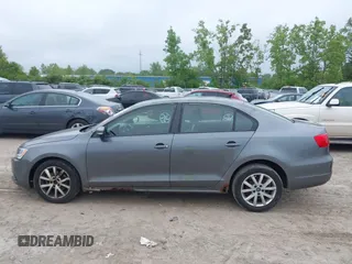 2011 Volkswagen Jetta SE with VIN 3VWDZ7AJ4BM370033, listed as a IAAI auction lot 42367238 with 161,635 mi miles and . Bid and sale history available at DreamBid. Image 14.