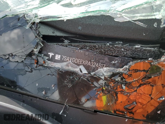 2024 Tesla Model Y Long Range z VIN 7SAYGDEEXRA324517, wystawiony jako Copart lot #55274615 z przebiegiem Nie podano mil oraz Szkoda całkowita • Salvage title. Historia ofert i sprzedaży dostępna na DreamBid. Obrazek 13.
