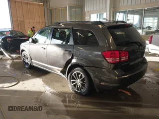 2018 Dodge Journey SE with VIN 3C4PDCAB1JT519745, listed as a IAAI auction lot 41366307 with 131,436 mi miles. Bid and sale history available at carsss.com. Image 3.