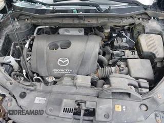 2016 Mazda CX-5 Sport with VIN JM3KE2BE8G0804398, listed as a IAAI auction lot 40490953 with 116,279 mi miles and . Bid and sale history available at DreamBid. Image 10.