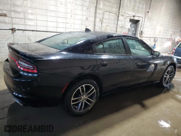 2019 Dodge Charger SXT with VIN 2C3CDXJG1KH757949, listed as a Copart auction lot 82231714 with 75,985 mi miles and Salvage Title. Bid and sale history available at DreamBid. Image 3.