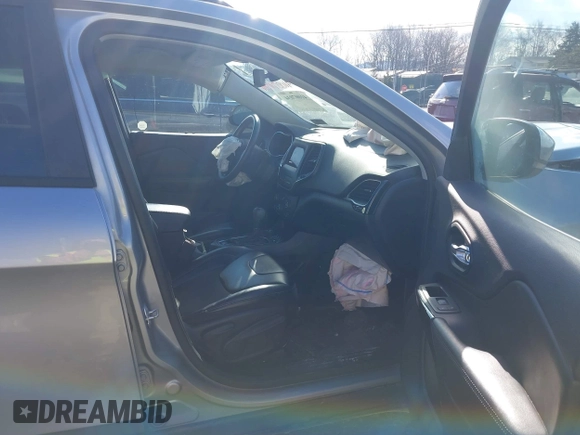 2019 Jeep Cherokee Latitude Plus with VIN 1C4PJMLB0KD320947, listed as a IAAI auction lot 41225801 with 64,537 mi miles and . Bid and sale history available at DreamBid. Image 5.