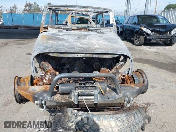 2009 Jeep Wrangler X with VIN 1J4FA24199L759273, listed as a IAAI auction lot 41472498 with Not Provided miles and . Bid and sale history available at DreamBid. Image 6.